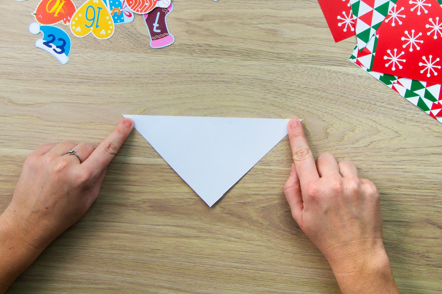 a paper triangle lay on a desk