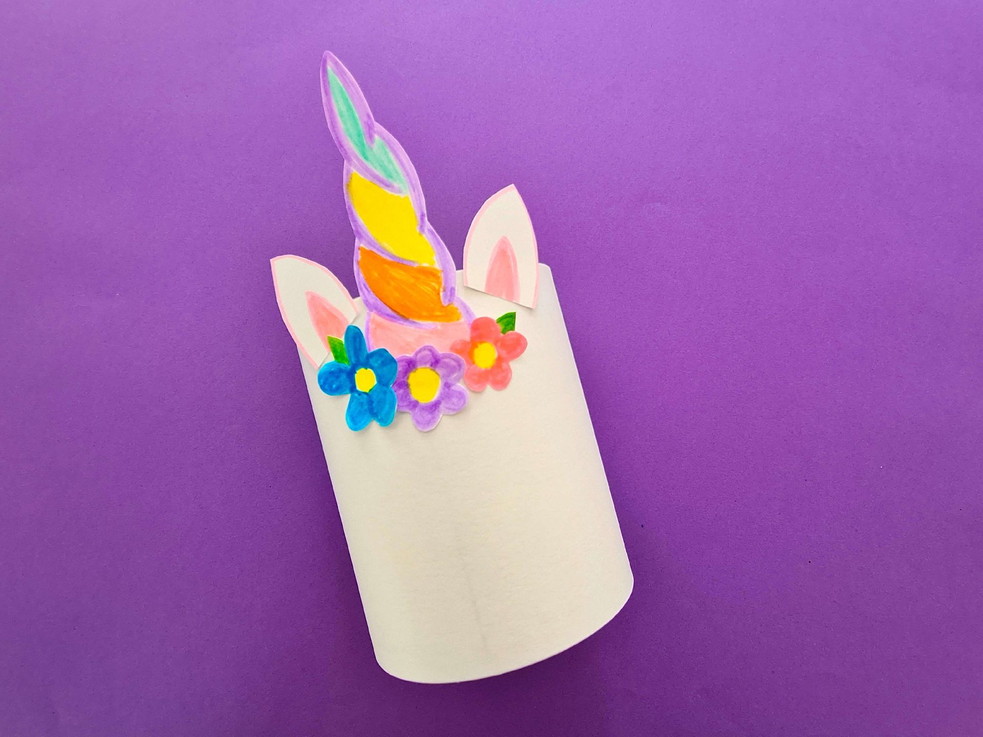 a partially completed unicorn pencil pot
