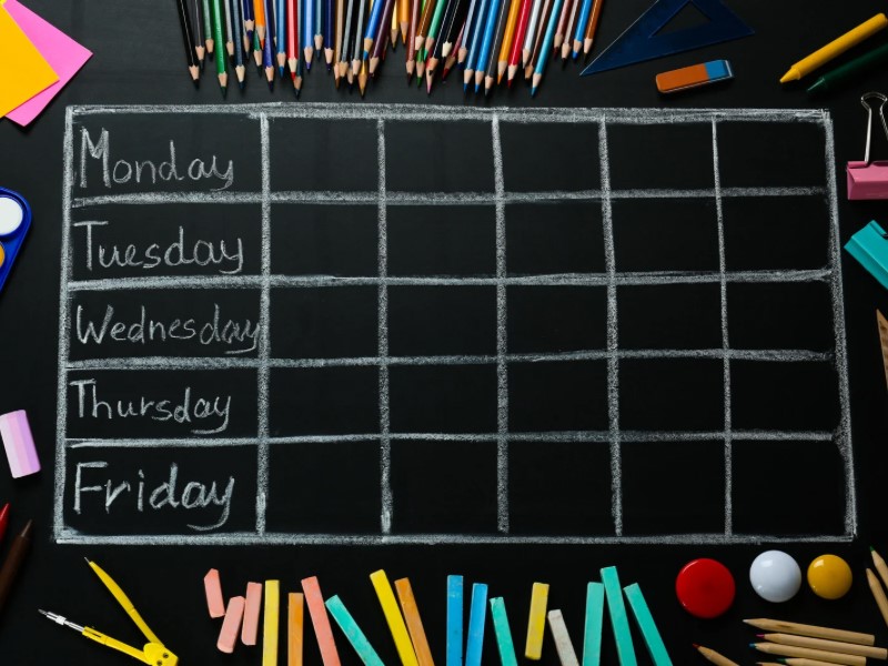 Weekly planner on chalkboard