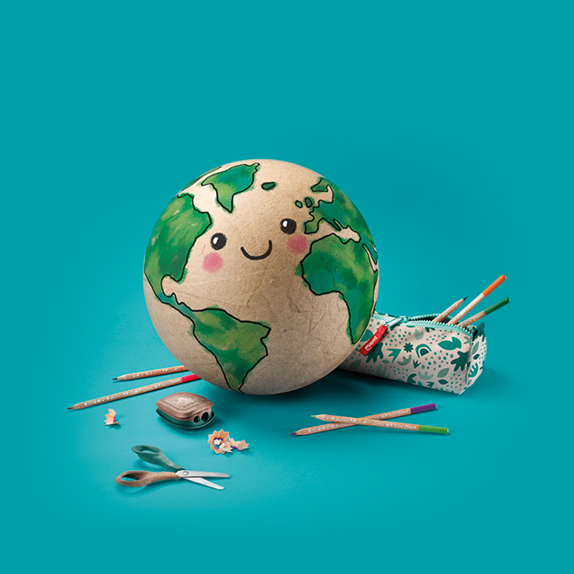 a smiling Earth surrounded by the smiling planet stationery range