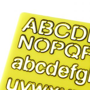 Yellow and black Oxford Vision lettering stencil