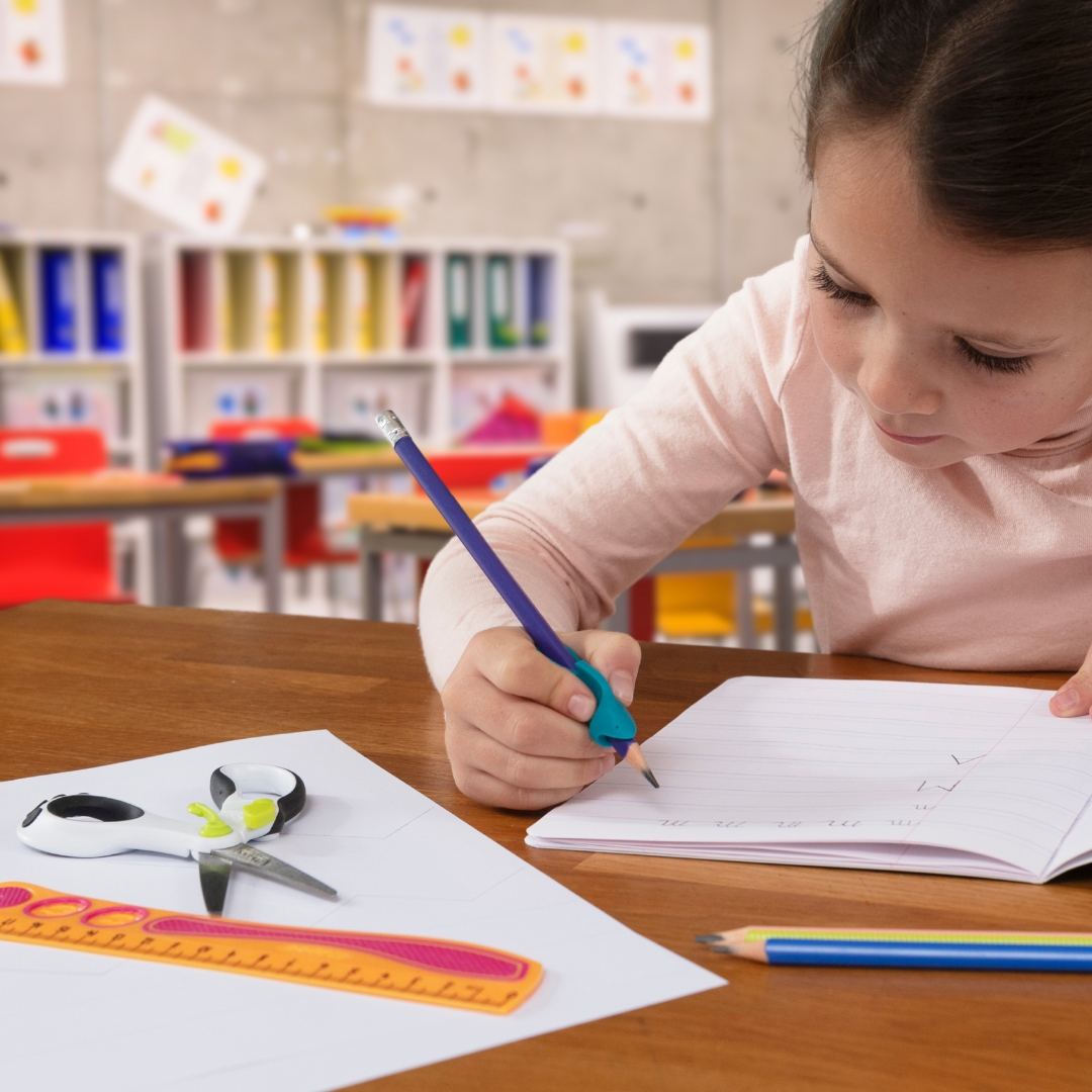 girl revising at her school desk 